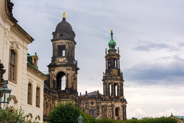 Fototapeta na wymiar View of Catholic Cathedral and Oberlandesgericht of Dresden. Cathedral of the Holy Trinity is an important Catholic church of the city Dresden.