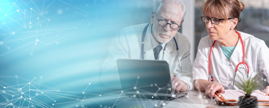 Two Doctors Discussing About Medical Report On Laptop; Multiple Exposure