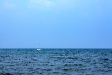 sailboat anchored in the sea