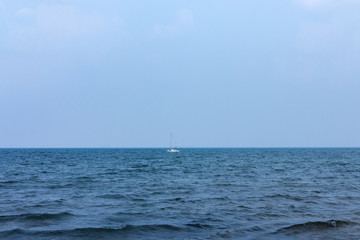 sailboat anchored in the sea