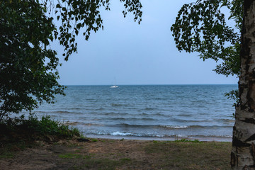 sailboat anchored in the sea
