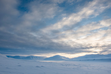 Fototapeta na wymiar Sun returning after the dark winter season, Sassen valley, Spitsbergen