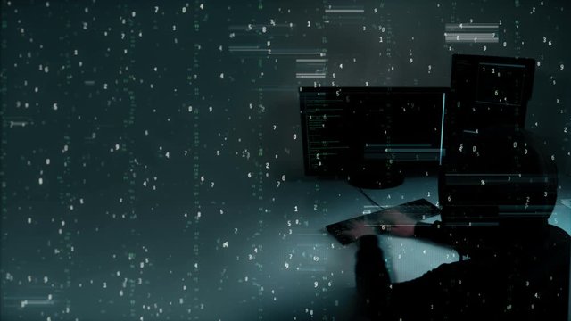 Hacker a programmer is typing terminal code hands on keyboard very fast. Theme of technological background of cyber security and hacking Internet networks. Green code is visible on computer monitor.