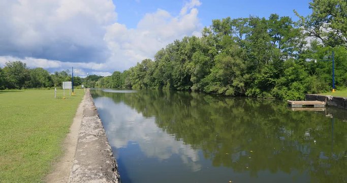 Erie Canal New York Palmyra channel and Lock. Pioneer engineering wonder. 363 miles long man made waterway built in 1817. Transport of cargo from eastern ports and cities.