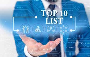 Writing note showing Top 10 List. Business concept for the ten most important or successful items in a particular list Male wear formal work suit presenting presentation smart device