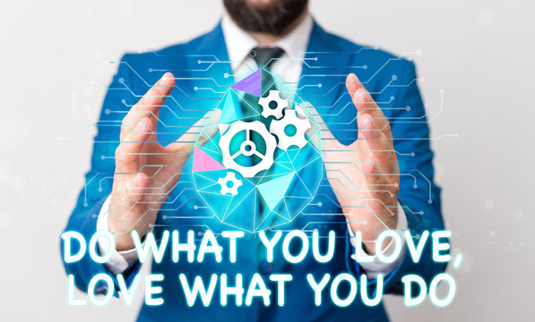 Text sign showing Do What You Love Love What You Do. Business photo text Pursue your dreams or passions in life Male human wear formal work suit presenting presentation using smart device