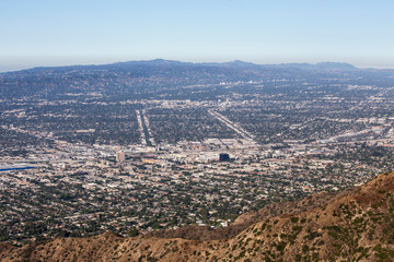 Mountaintop view of Burbank, Los Angeles, the San Fernando Valley and the Santa Monica Mountains in Southern California.