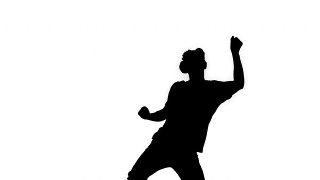Silhouette Advanced gamer in casual outfit playing dancing game in VG headset.