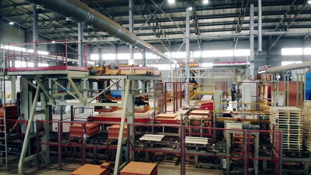 Big factory room with working equipment.