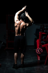 Fototapeta na wymiar Physically Mature Man Showing His Well Trained Back