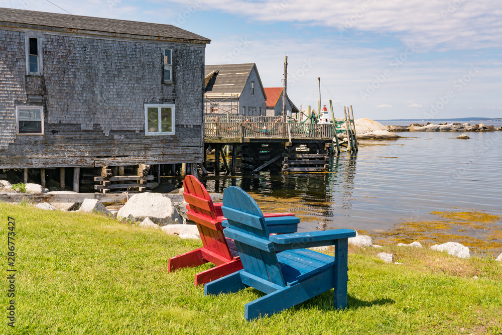 Wall mural Adirondack Chairs Along the Coast in Nova Scotia