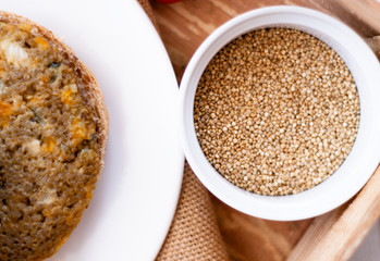quinoa vegetable burger with quinoa bowl