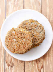 quinoa vegetable burger on white dish