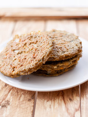 quinoa vegetable burger  on white dish