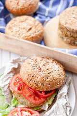 quinoa vegetable burger wih tomato