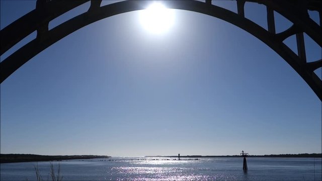 bridge with bright sun shining through
