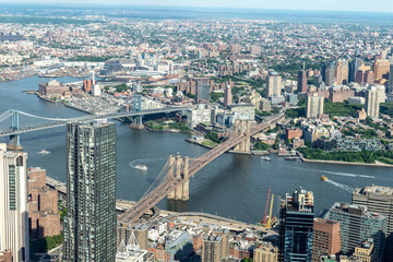 Obraz premium Manhattan aerial View with its bridges, Brooklyn Bridge and Manhattan Bridge
