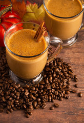 A Pumpkin Spice Latte on a Rustic Wooden Table