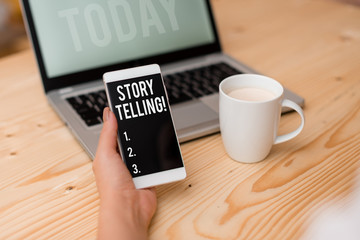 Word writing text Story Telling. Business photo showcasing activity writing stories for publishing them to public woman laptop computer smartphone mug office supplies technological devices