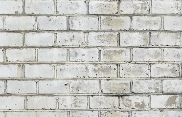 Fototapeta premium Background of a white brick wall. Masonry texture.