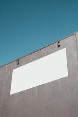 Wall with blank signage - empty banner ready for your artwork