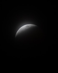 Sliver of full moon during eclipse