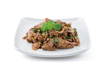 Spicy Grilled Pork Salad (Moo Yang Nam Tok) isolated on the white background , Traditional Thai food recipe