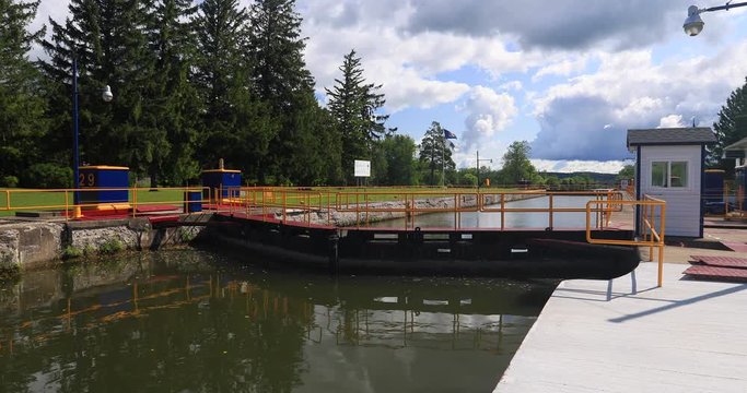 Erie Canal New York Palmyra Lock and channel. Pioneer engineering wonder. 363 miles long man made waterway built in 1817. Transport of cargo from eastern ports and cities.