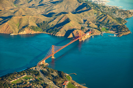 Aerial view of the Golden Gate Bridge in San Francisco and point Cavallo in the corner