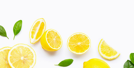 Fresh lemon and  slices with leaves isolated on white background.