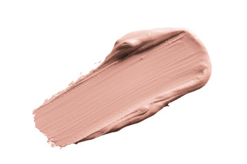 Cosmetic foundation cream swatch smudge smear isolated on white background. Beige makeup base brush stroke, swipe. Nude liquid powder creamy texture