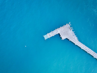 Jetty in blue water off Fraser Island, Queensland, Australia