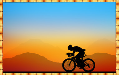 Fototapeta premium Silhouette Cycling on blurry sunrise sky background on a wooden sign