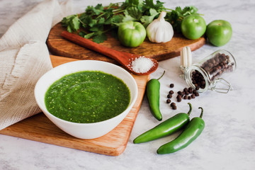 mexican green sauce, spicy hot chili sauce made with chilli pepper, garlic and tomatoes, food in Mexico