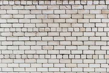White brick wall. White brick background. Grunge brick wall.