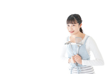 クッキングをする若い女性