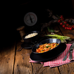 colorful turkey fricassee with asparagus and paprika