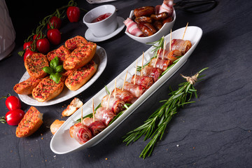 dates wrapped in bacon and delicious tapas