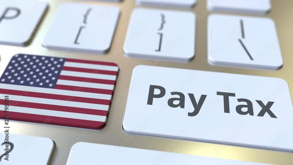 Poster pay tax text and flag of the united states on the buttons on the computer keyboard. taxation related