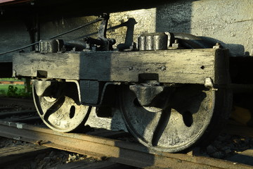 Fototapeta na wymiar Old Train Wheels at Sunset