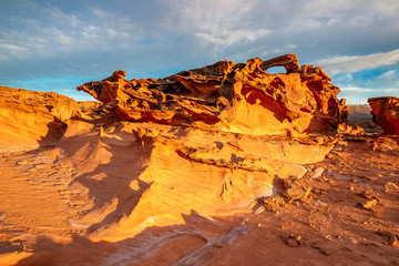 Fototapeta na wymiar USA, Nevada, Clark County, Gold Butte National Monument. Red Aztec sandstone rock formations at Devil's Fire / Little Finland.
