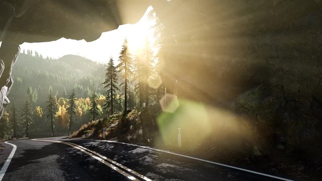 rocky road tonel in mountain at sunset