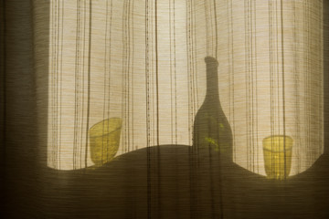 Collage on the theme of alcoholism, the curvature of space. Silhouettes of bottles and glasses...