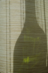 Collage on the theme of alcoholism, the curvature of space. Silhouettes of bottles and glasses...
