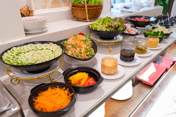 Salad bar with vegetables in the restaurant, healthy food