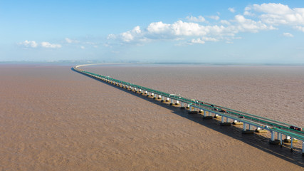 Aerial view of the Hangzhou Bay Bridge, among ten of the longest trans-ocean bridges in the world, in Zhejiang, China.