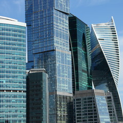Obraz premium Business in Russia, fragment of modern business center buildings on blue sky background