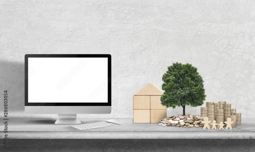 Wall mural Money Saving concept,Trees plant on gold coins stack , Home Wooden and desktop computer blank screen. success Saving money to buy a house, accumulating money.Investment loans for homes - Wall murals