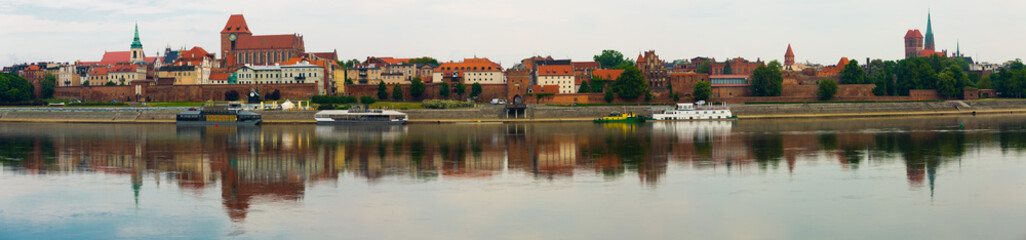 Obraz premium Panorama of Torun across Vistula river