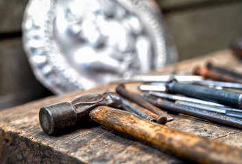 Silversmiths tools on the silver workplace